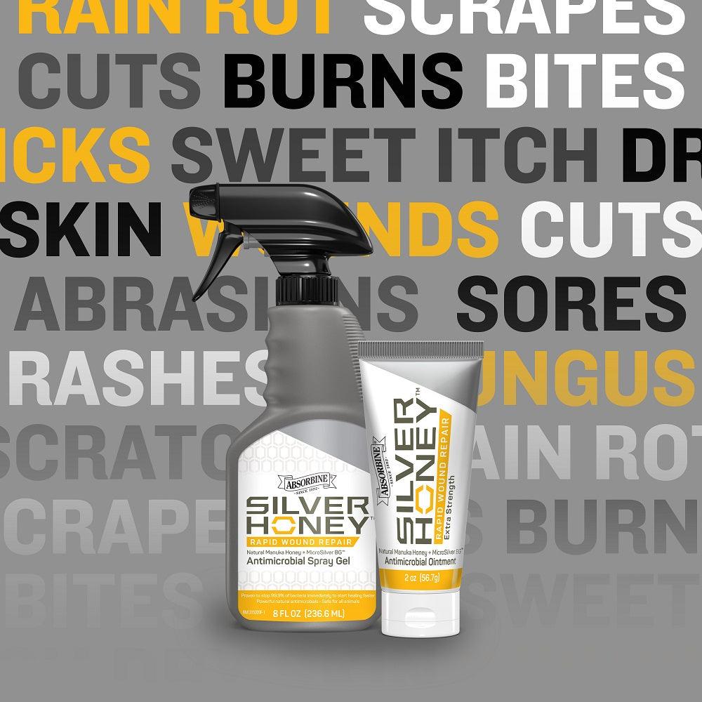 Silver honey Rapid Wound Repair Antimicrobial Spray Gel standing next to a tube of Silver Honey Rapid Wound Repair extra strength ointment.