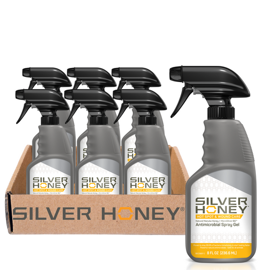 Silver Honey antimicrobial spray gel bottles with a cardboard box on a white background